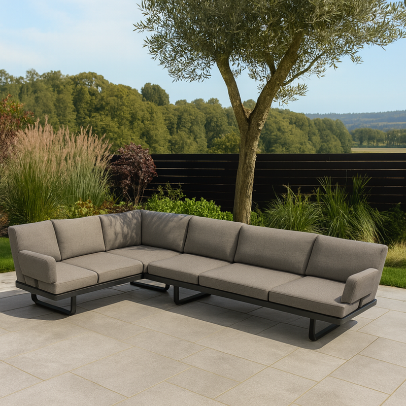 Outdoor sectional lounge suite with sunloungers in a new zealand set background