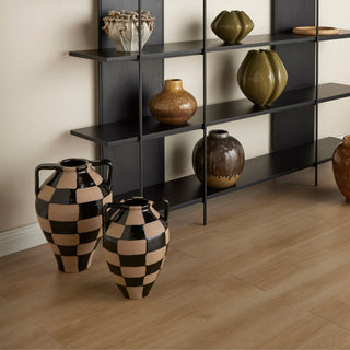 Two large urn style vases with black and cream blocks painted on them