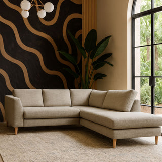 Beige corner sofa with a chaise in a modern abstract room
