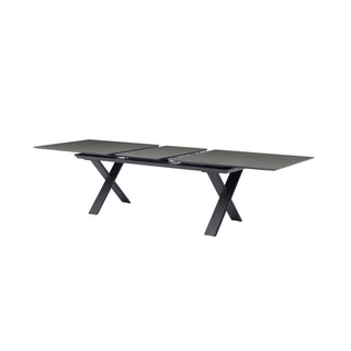 A modern black extendable dining table with a rectangular top and X-shaped metal legs, shown on a plain white background.
