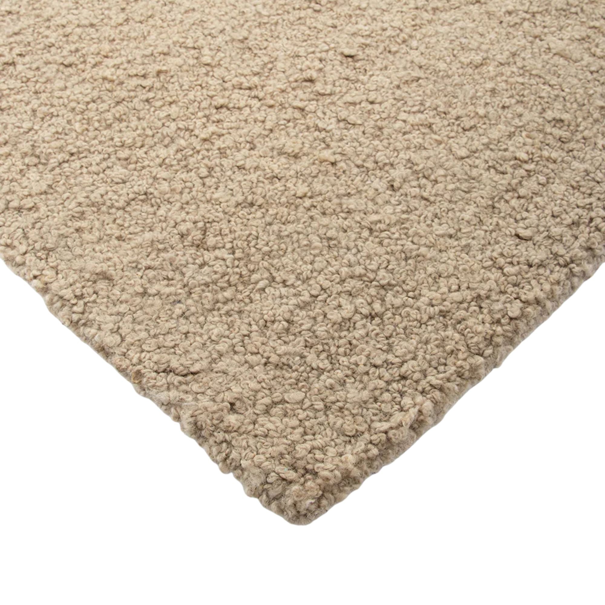 Beige carpet texture on a white background