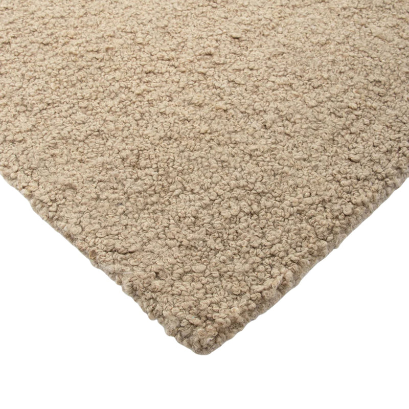 Beige carpet texture on a white background