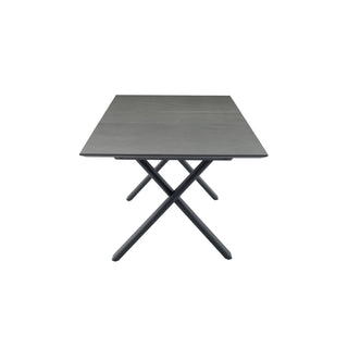A rectangular dining table with a dark gray wood-grain top and a black metal X-frame base, shown against a plain white background.