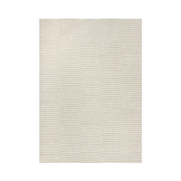 Beige rug with a subtle striped pattern on a white background