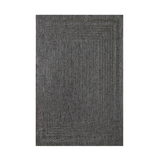 Dark gray textured rug on a white background