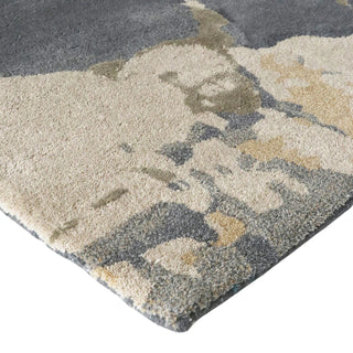 Close-up of a textured area rug with geometric pattern on a white background