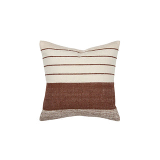 Striped pillow with brown and beige pattern on a white background