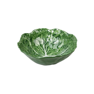 Green ceramic bowl shaped like a cabbage leaf on a white background