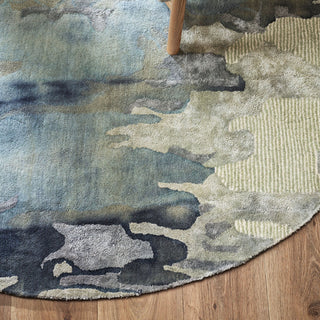 Abstract patterned rug on a wooden floor