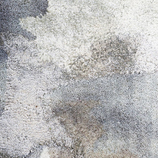Close-up of textured carpet with neutral colors