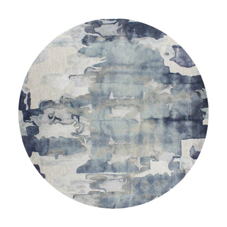 Round rug with abstract blue and gray pattern on a white background