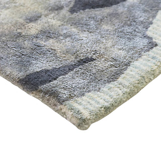 Close-up of a textured rug with a geometric pattern on a white background