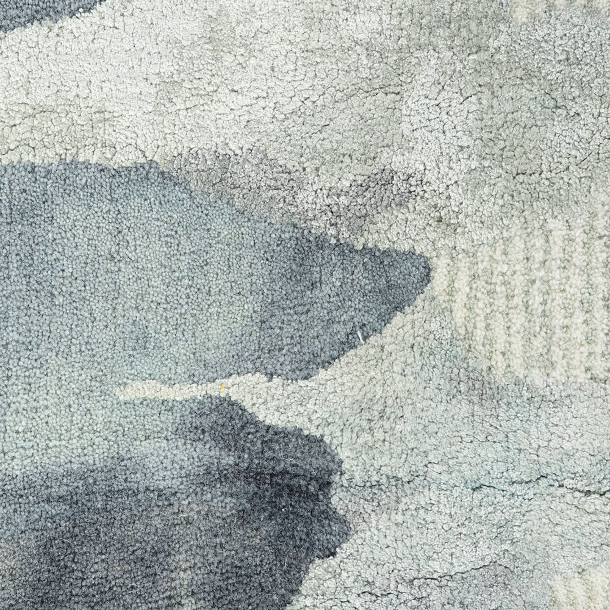 Close-up of textured gray and white surface