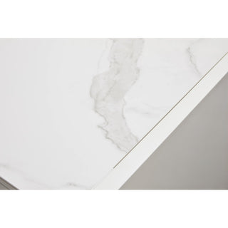 Close-up of a white marble countertop with a light gray base