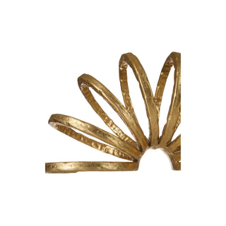 Close Up of SLinky Sculpture in gold metal