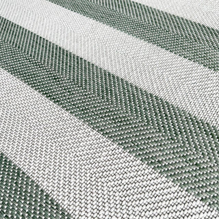 Close-up of green and white striped rug texture