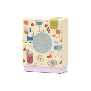 Product packaging with illustrations and 'here's how' branding on a white background