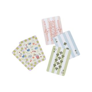 Set of four playing cards with different designs on a white background