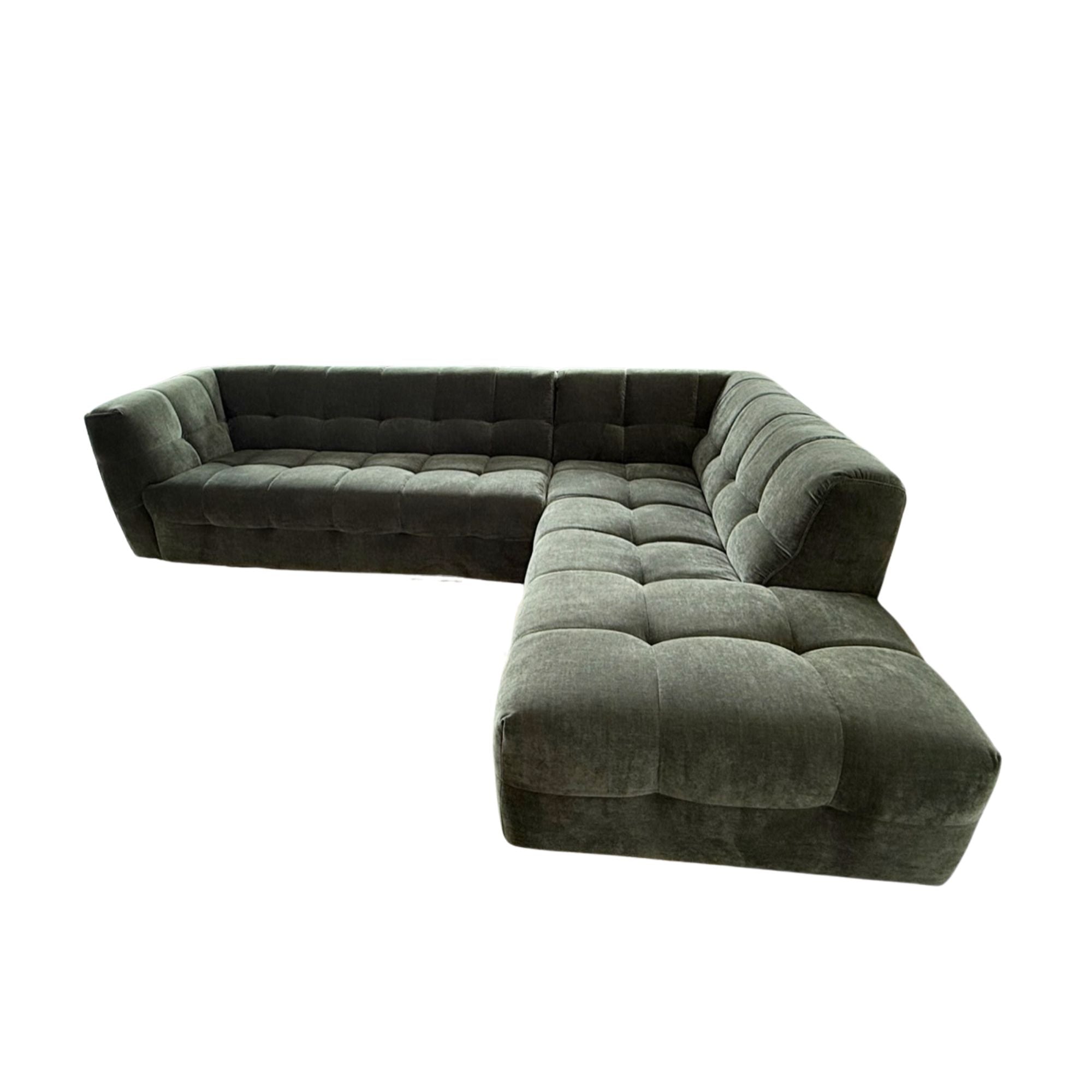 Green sectional sofa on a white background