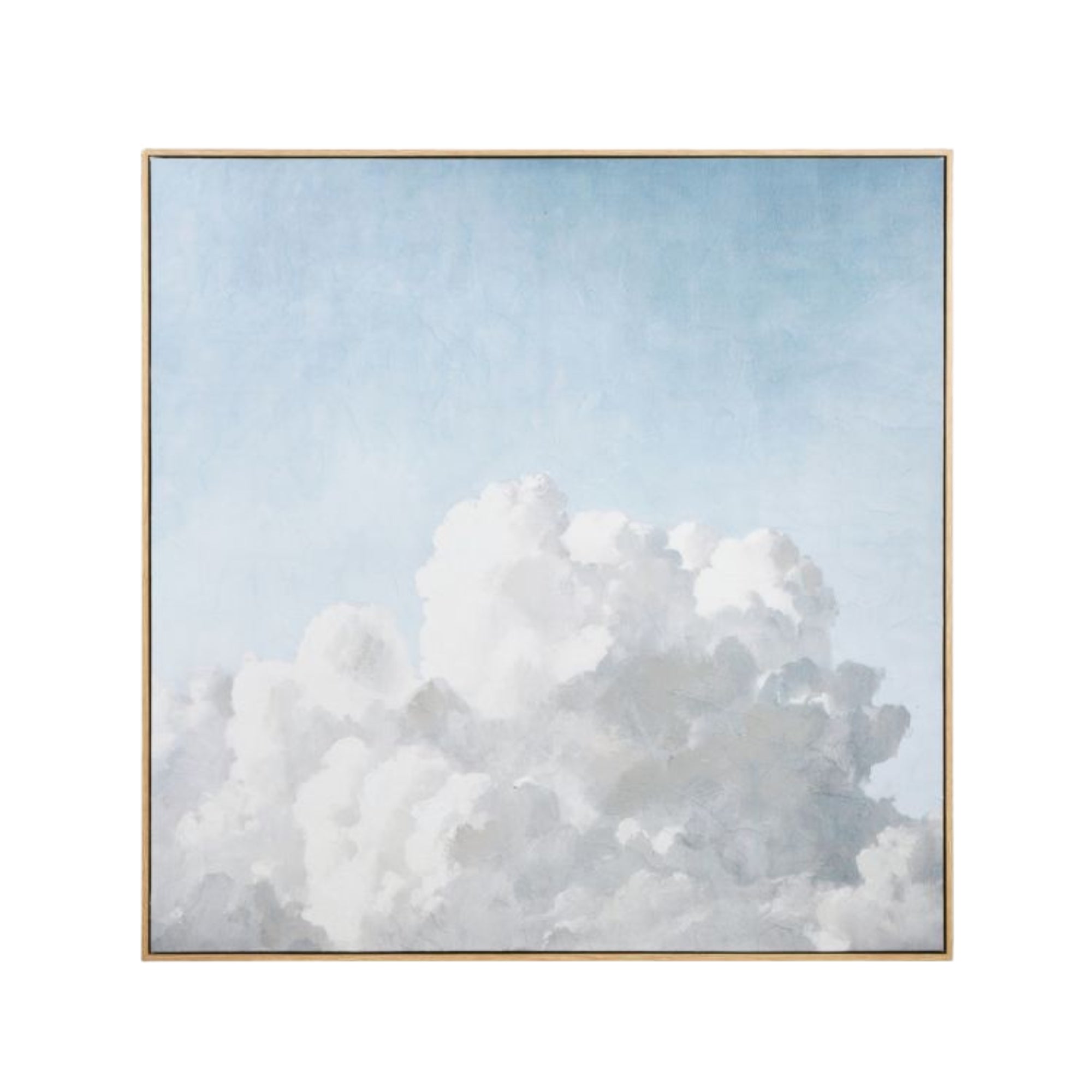 Framed artwork of a large cloud against a light blue sky