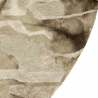 Close-up of a textured beige carpet corner
