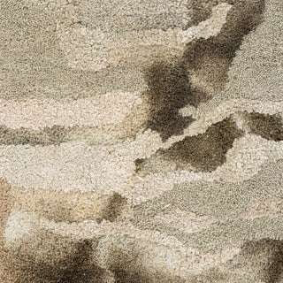 Close-up of a textured beige and brown carpet