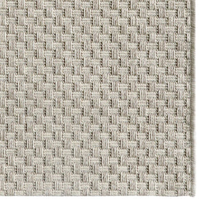Close-up of a textured woven fabric with a neutral color palette.