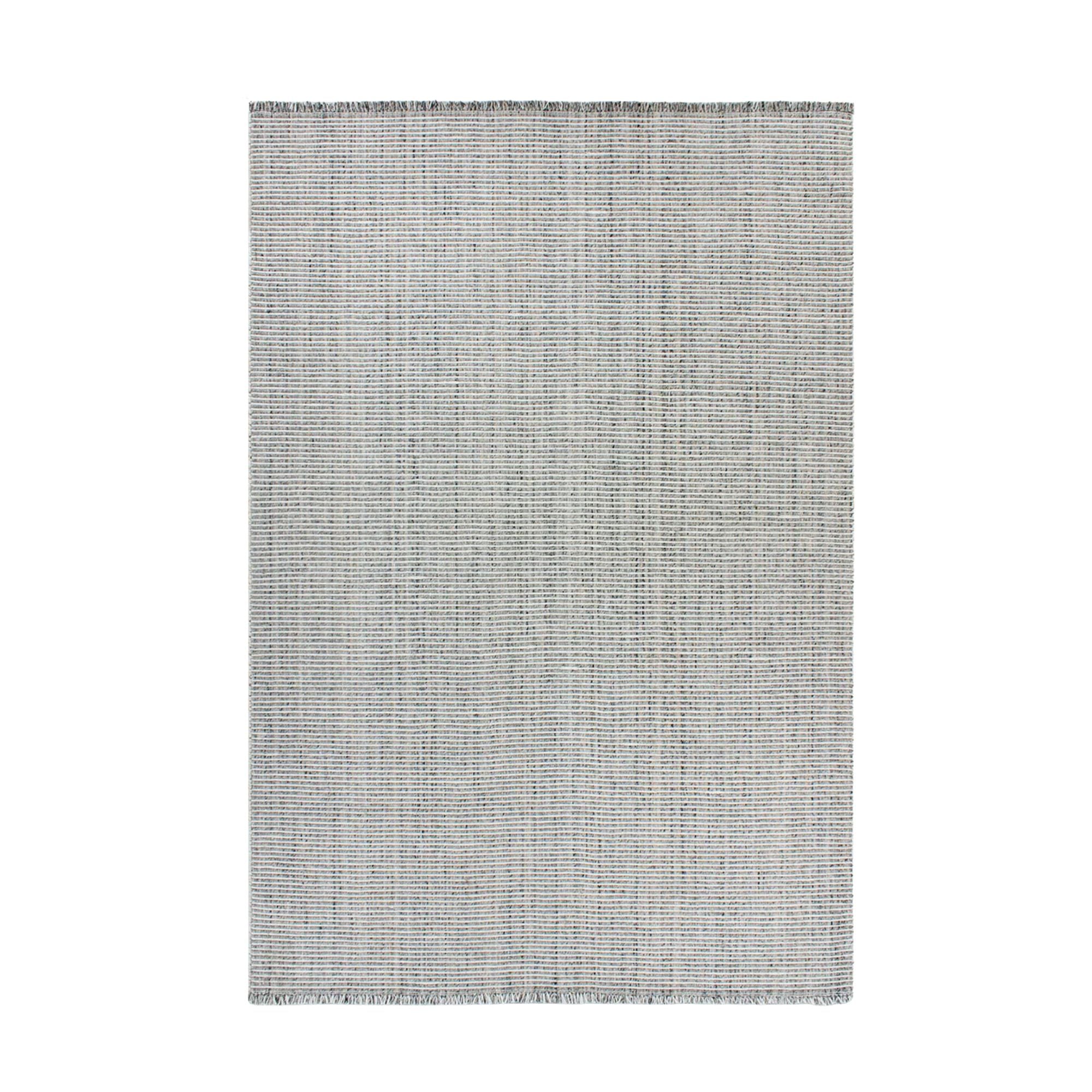 Gray textured rug on a white background