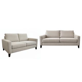 Two beige sofas on a white background