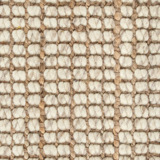 Close-up of a textured beige and brown woven pattern
