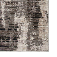 Patterned rug with brown, black, and beige colors on a white background