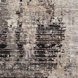 Close-up of a textured rug with brown, beige, and black colors.