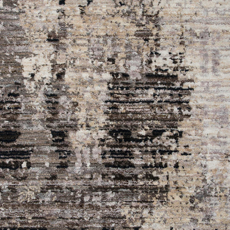 Close-up of a textured rug with brown, beige, and black colors.