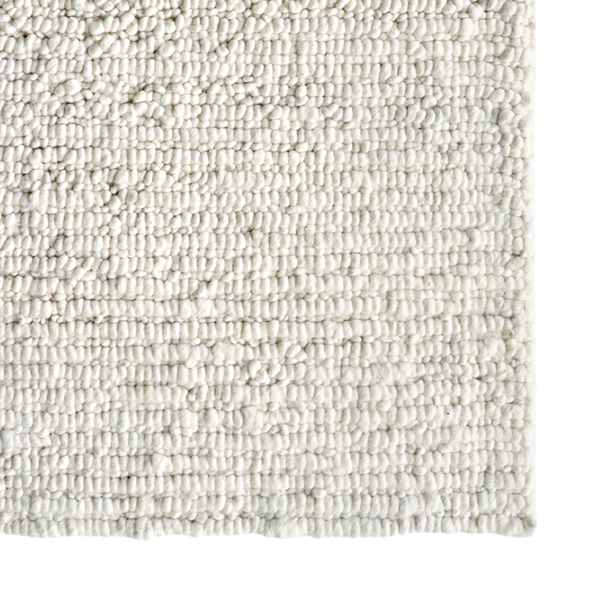 Textured beige fabric swatch on a white background