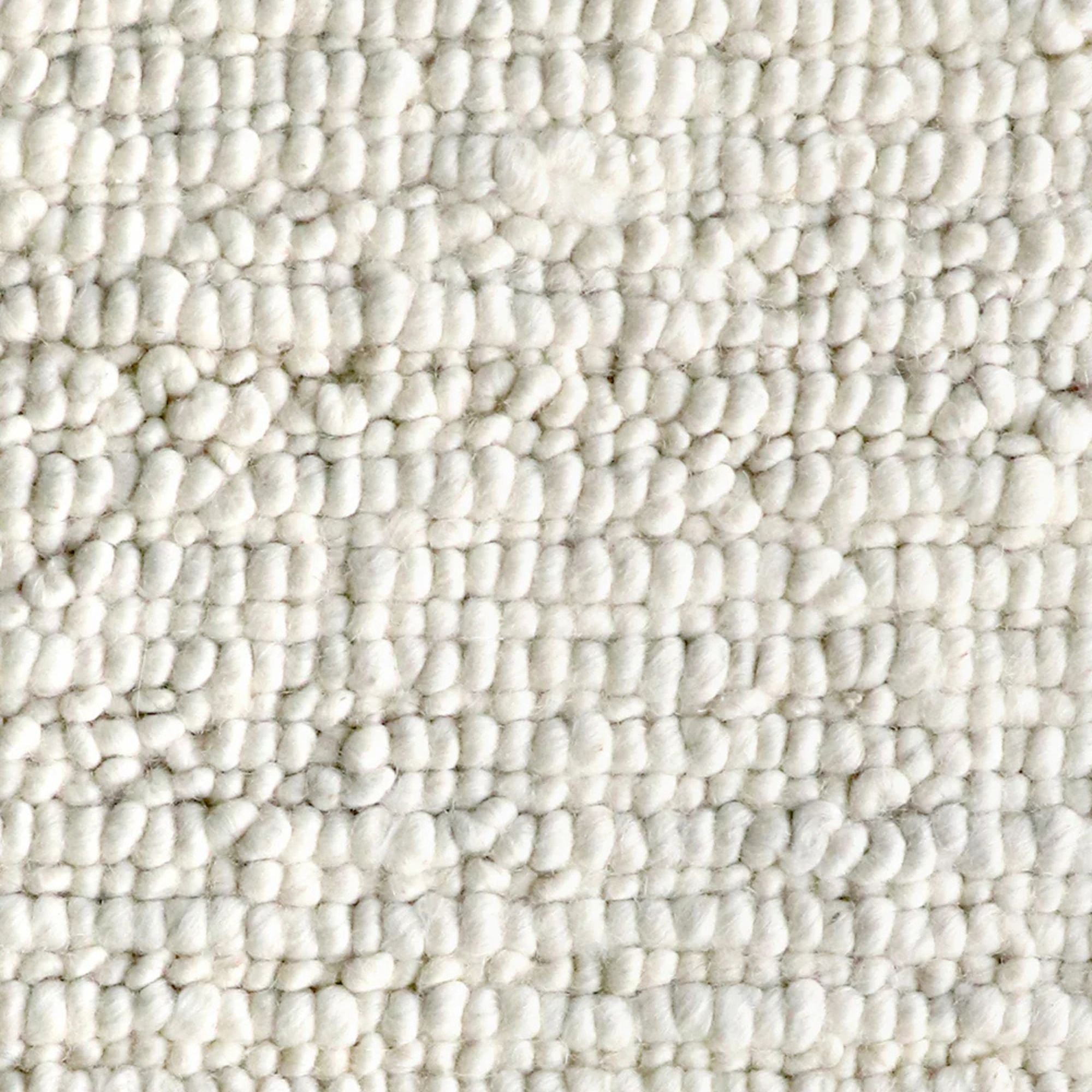 Close-up of textured rug 100% wool