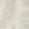 Close-up of a textured beige fabric surface