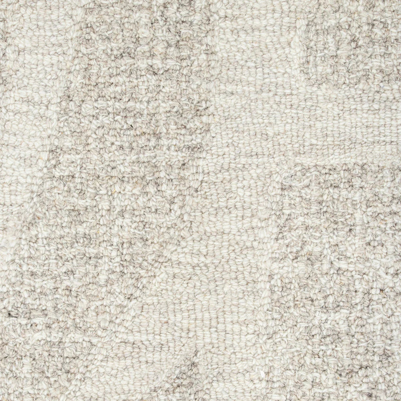 Close-up of a textured beige fabric surface