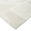 Close-up of a textured beige rug on a white background