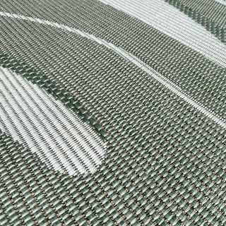 Close-up of a woven fabric with green and white stripes