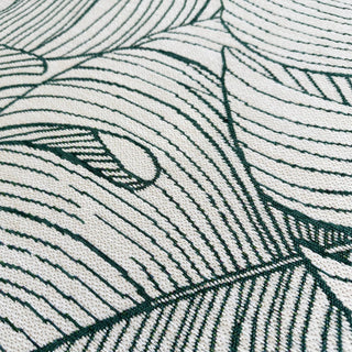 Close-up of a textured rug with leaf pattern