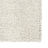 Close-up of a textured beige carpet sample