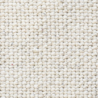 Close-up of a textured beige fabric surface