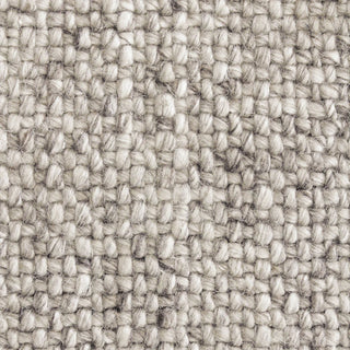 Close-up of a textured beige fabric Rug
