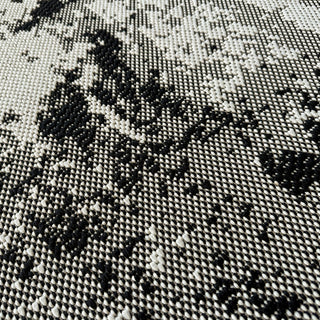 Close-up of a textured black and white fabric pattern