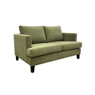 Green sofa on a white background