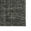 Textured black and gray rug corner