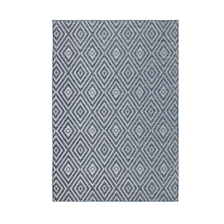 Gray and white geometric patterned rug on a white background