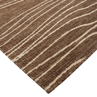 Brown and beige striped rug on a white background