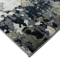 Camouflage-patterned rug with a mix of colors on a white background