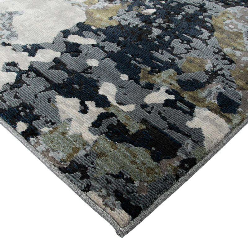 Camouflage-patterned rug with a mix of colors on a white background